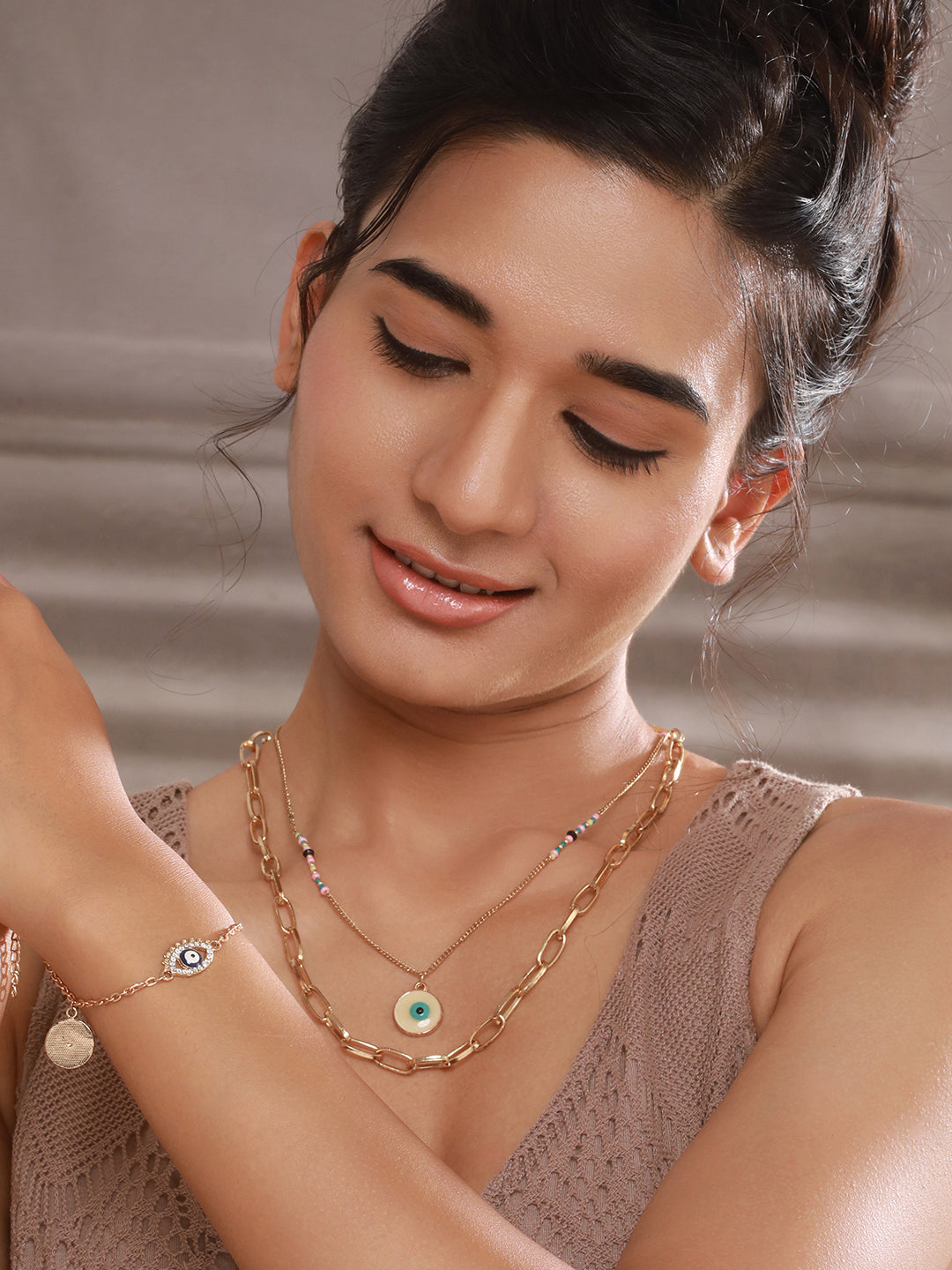 Jazz and Sizzle Gold-Plated Beads Studded Evil Eye Necklace With Bracelet Jewellery Set