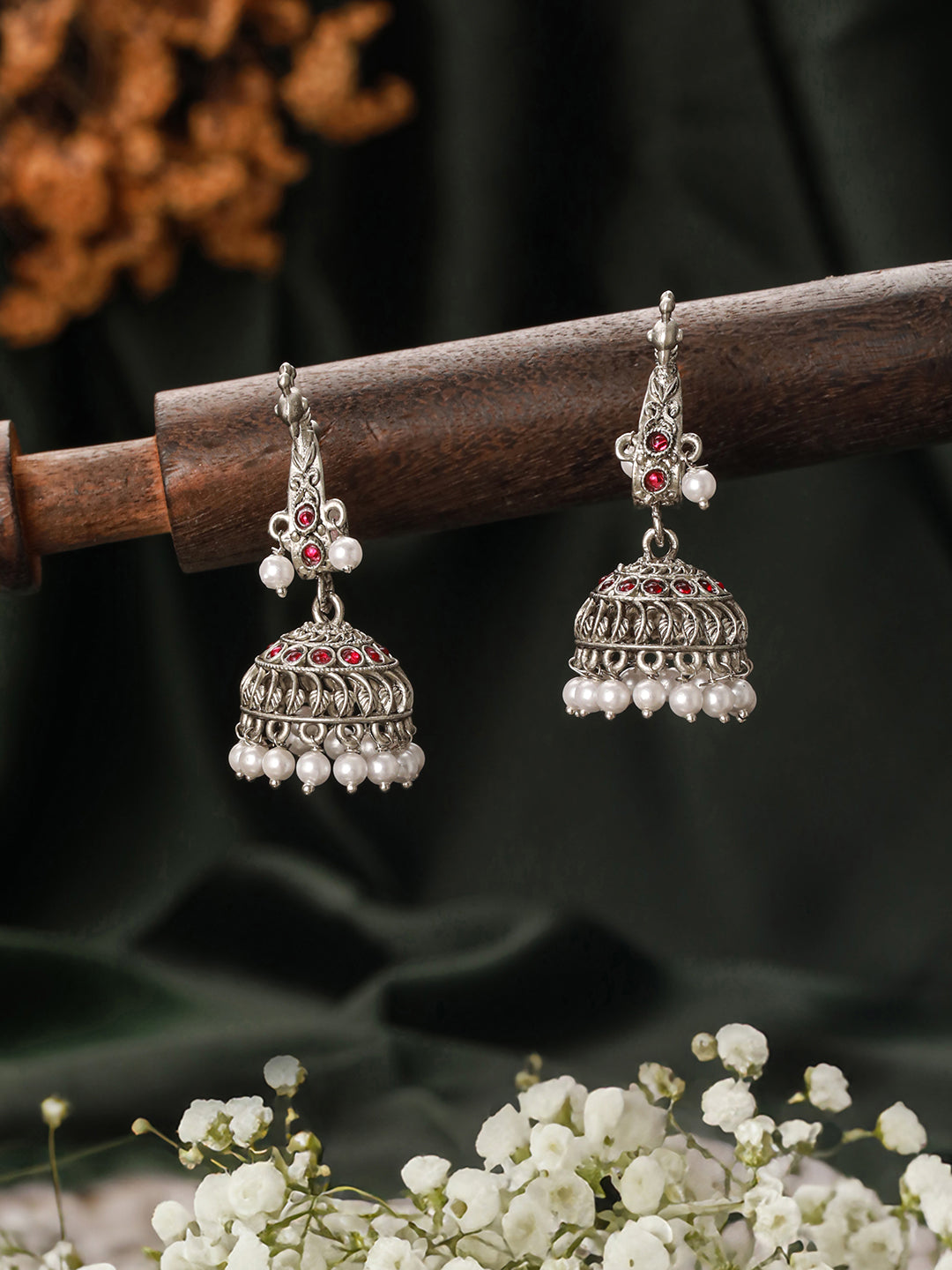 Jazz And Sizzle Silver-Plated Peacock Shaped Jhumka Earrings