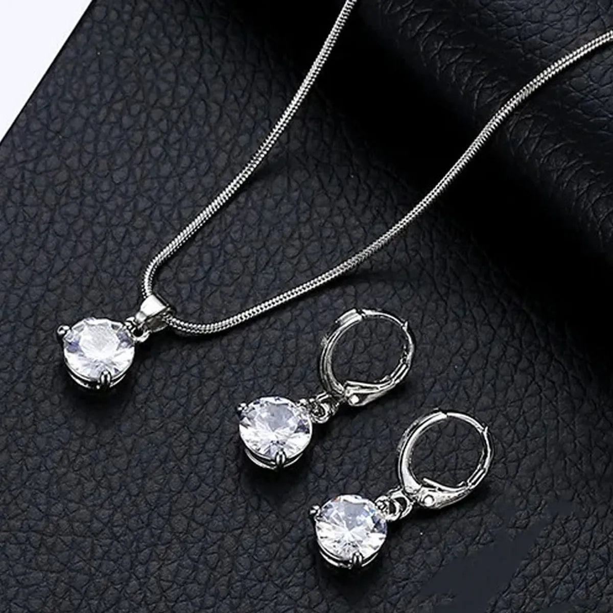 Jazz And Sizzle Rhodium Plated & American Diamond-Studded Pendent Set with Hoop Earrings