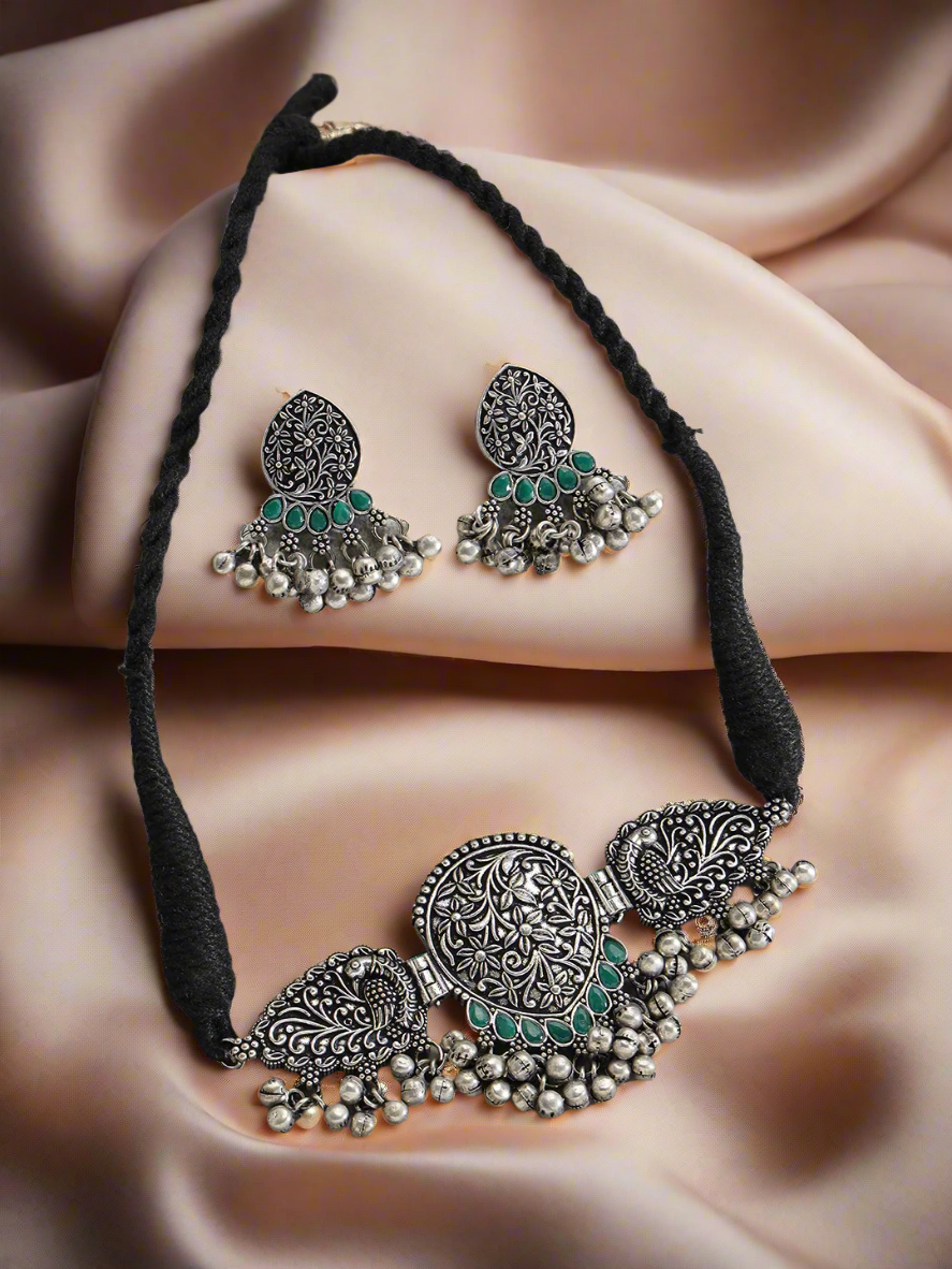 Oxidized Silver-Plated Green Stone-Studded & Beaded Handcrafted Peacock Shaped Jewelry Set