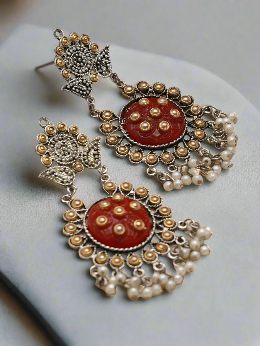Dual Toned White Kundan Studded & Pearl Beaded Orange Drop Earrings