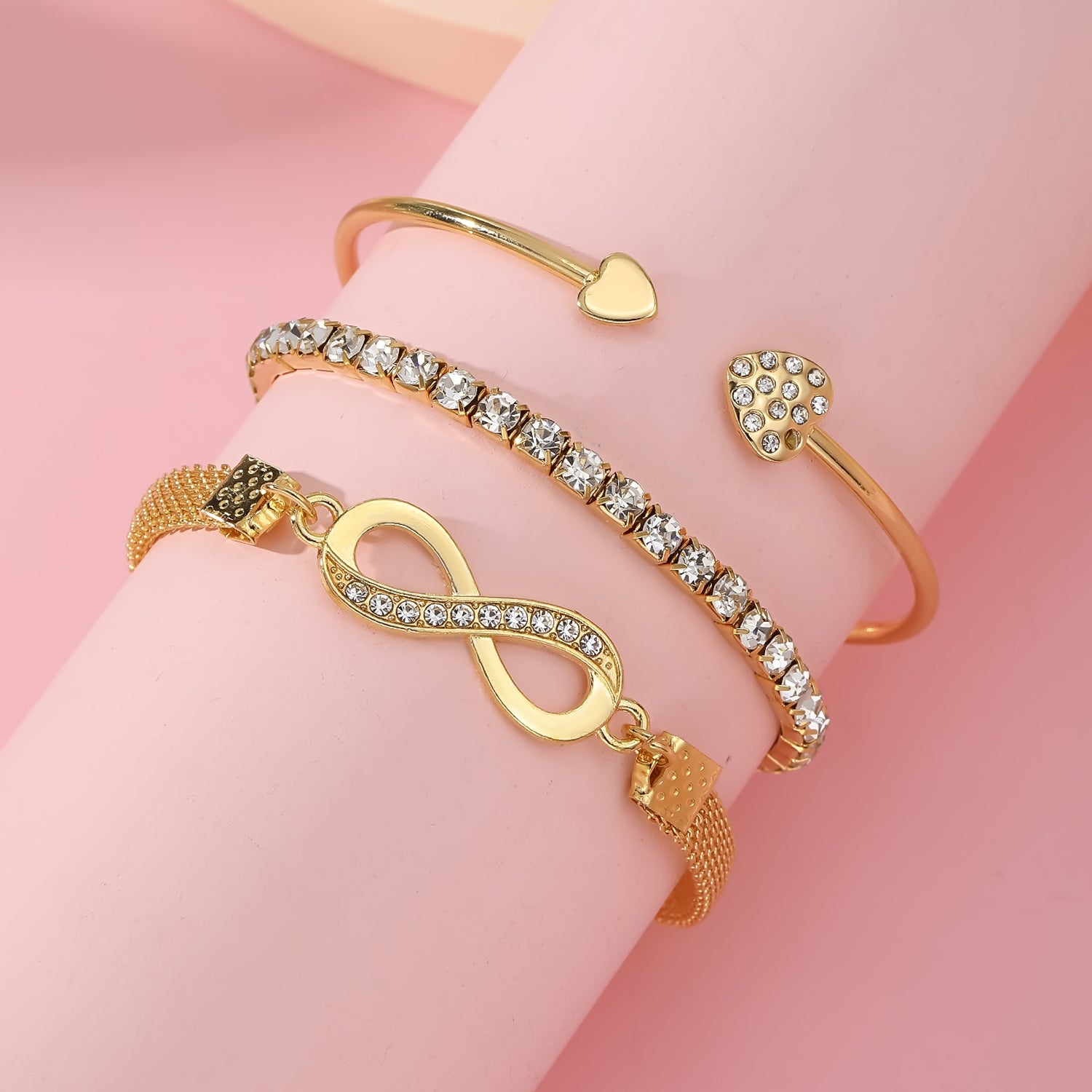 Jazz And Sizzle Set of 3 Gold Plated CZ Studded Infinity & Heart Shaped Stacking Bracelet for Valentines Gift