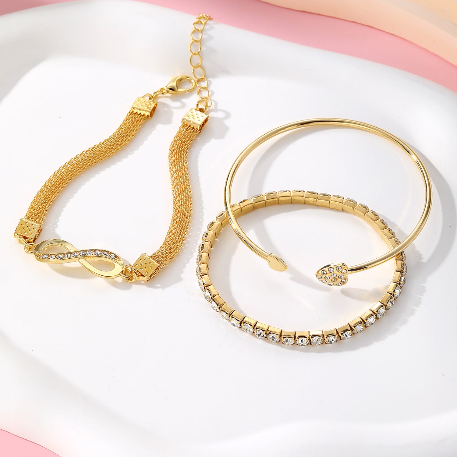 Jazz And Sizzle Set of 3 Gold Plated CZ Studded Infinity & Heart Shaped Stacking Bracelet for Valentines Gift