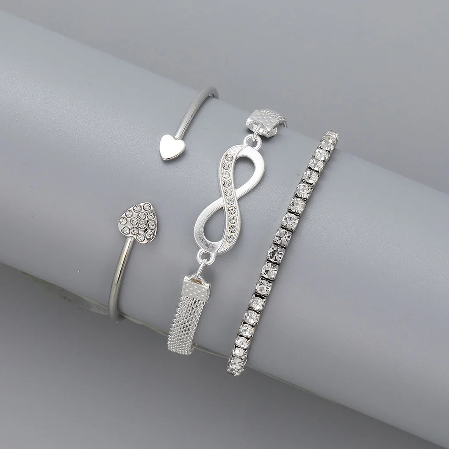 Jazz And Sizzle Set of 3 Silver Plated CZ Studded Infinity & Heart Shaped Stacking Bracelet for Valentines Gift