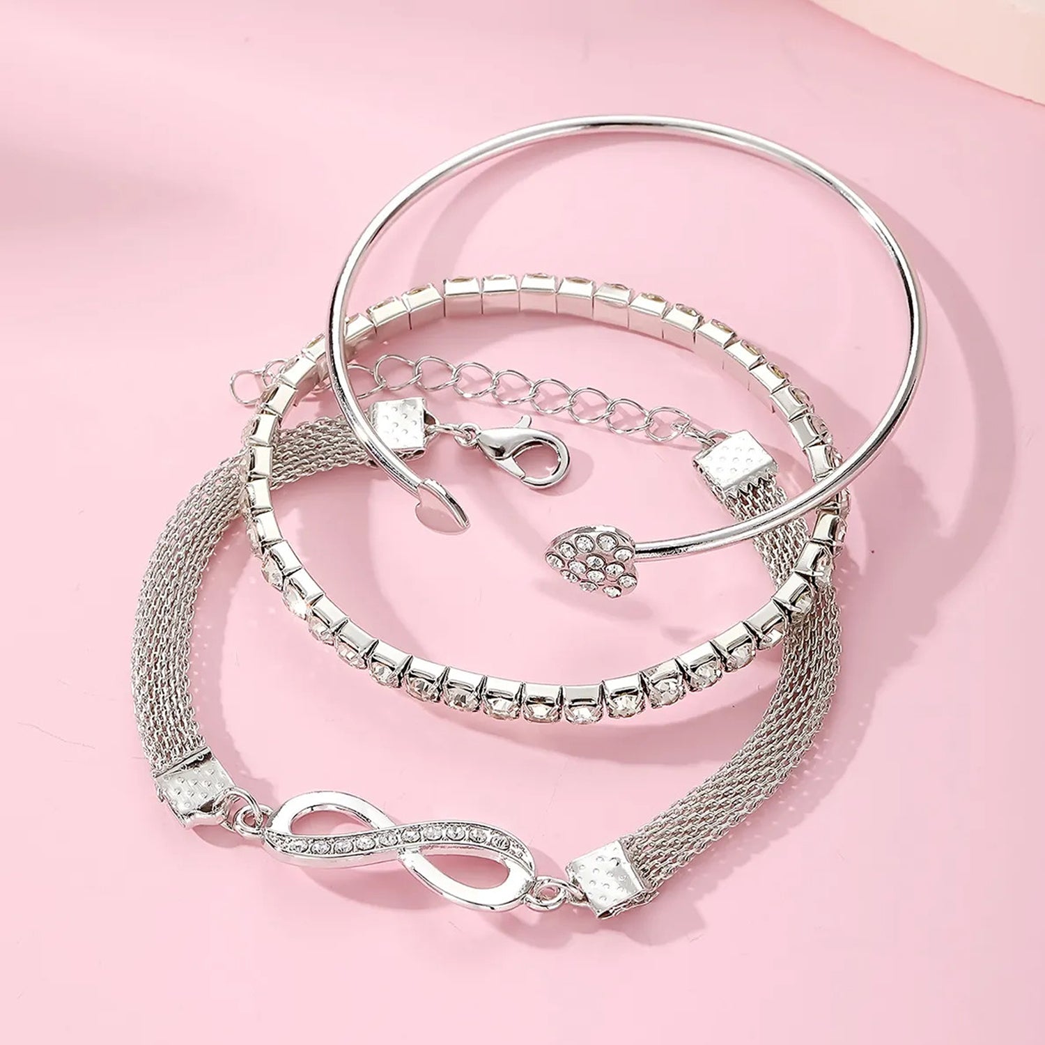 Jazz And Sizzle Set of 3 Silver Plated CZ Studded Infinity & Heart Shaped Stacking Bracelet for Valentines Gift
