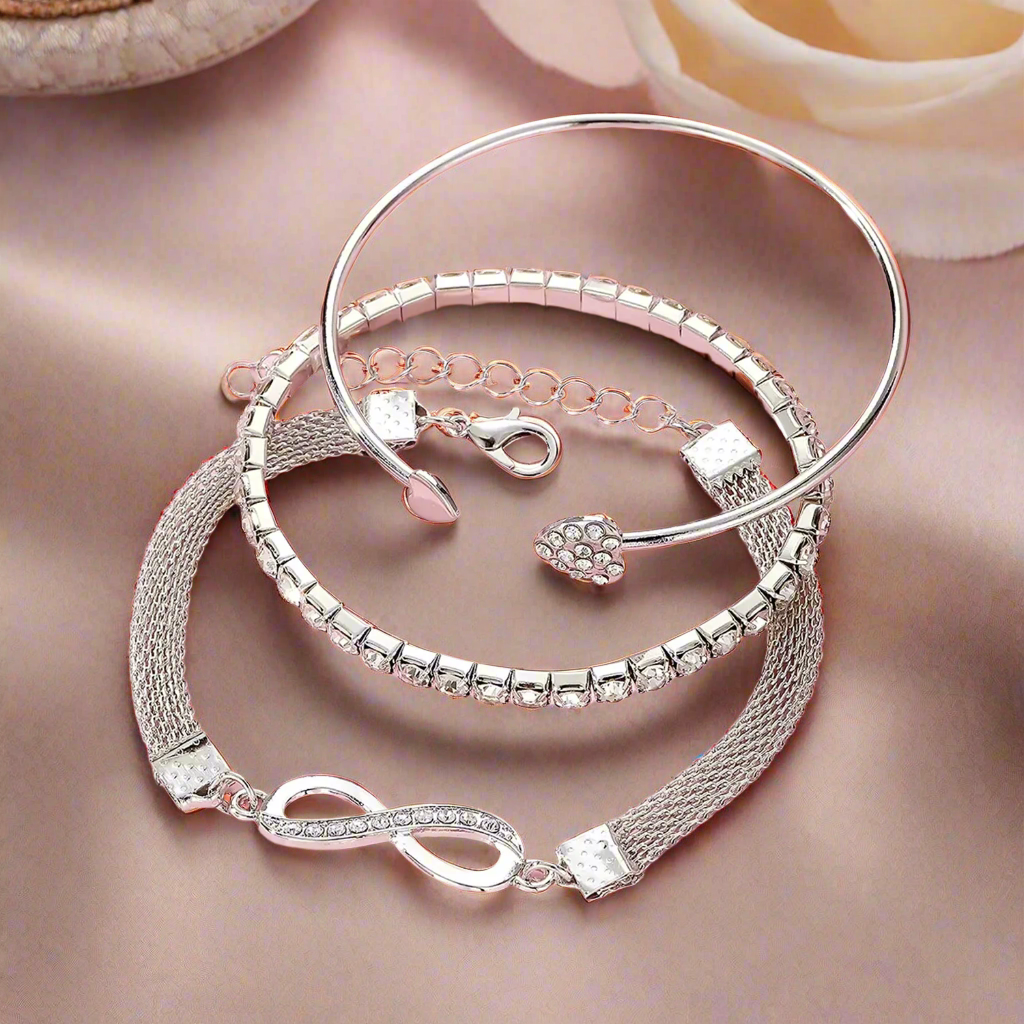 Jazz And Sizzle Set of 3 Silver Plated CZ Studded Infinity & Heart Shaped Stacking Bracelet for Valentines Gift