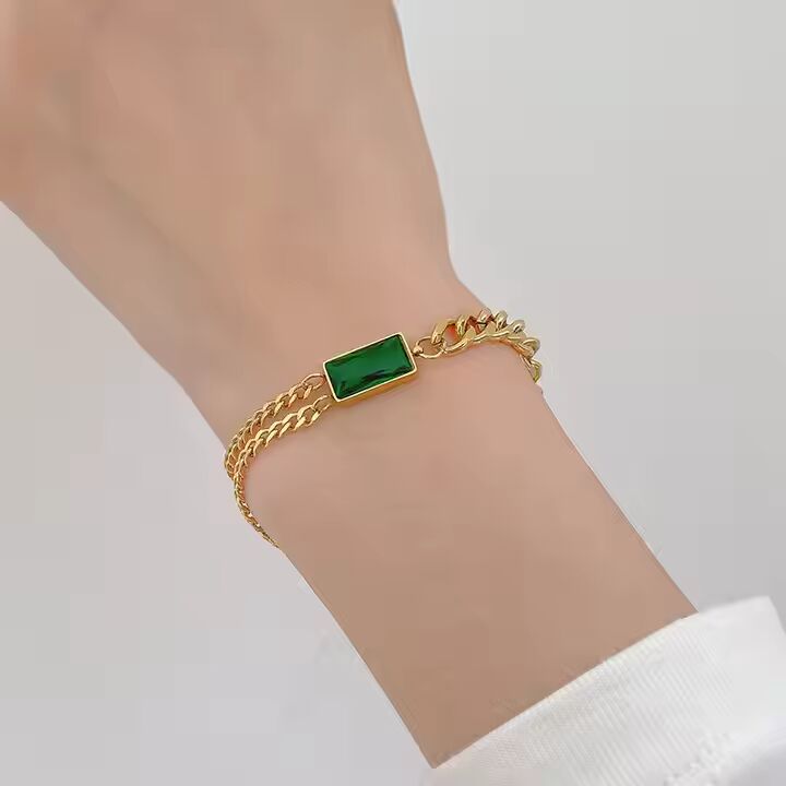 Jazz And Sizzle Gold Plated Green Stone Studded Stainless Steel Chain Bracelet