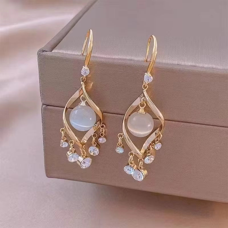 Jazz And Sizzle Stylish Gold Bow Stud Long Chain Earrings with White Flower Drop
