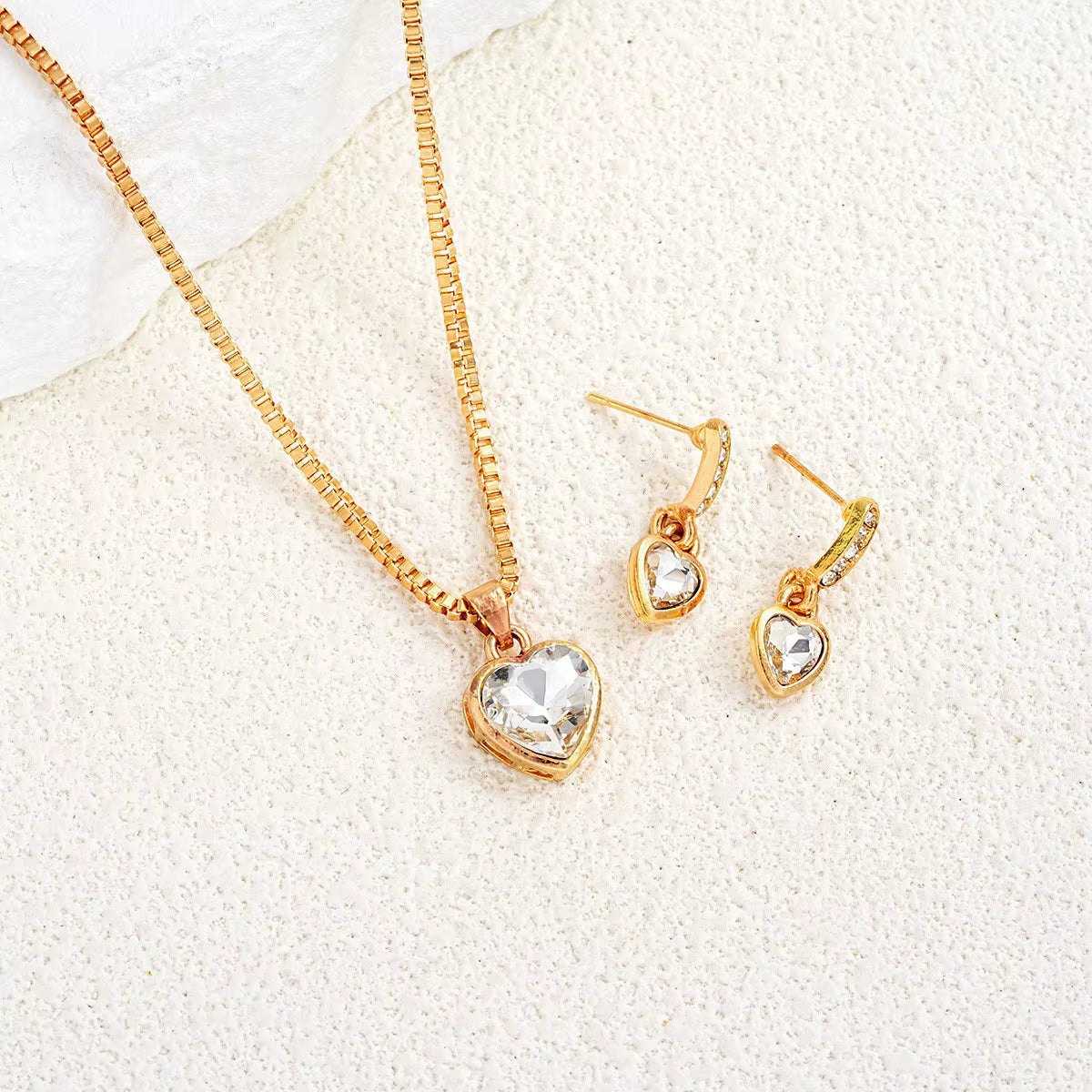 Jazz And Sizzle Gold Plated Heart Shaped Zircon Studded Necklace & Earrings Set