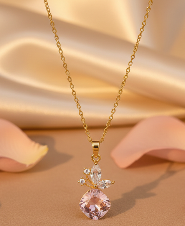 Jazz And Sizzle Pink Stone Studded Stylish Gold Plated Knot Pattern Necklace