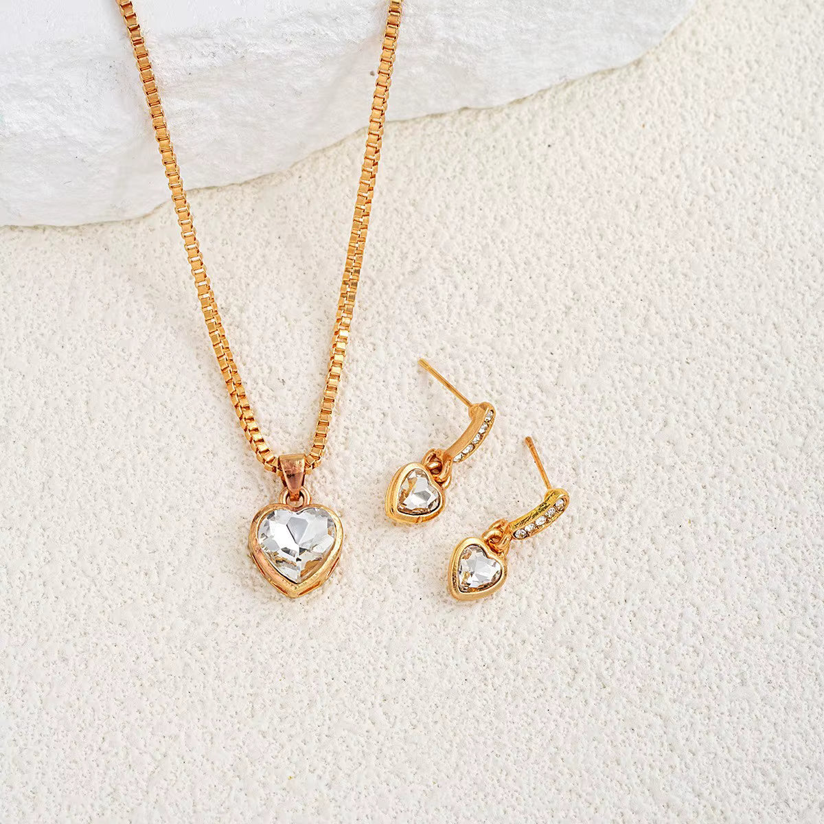Jazz And Sizzle Gold Plated Heart Shaped Zircon Studded Necklace & Earrings Set