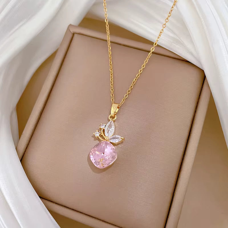 Jazz And Sizzle Pink Stone Studded Stylish Gold Plated Knot Pattern Necklace