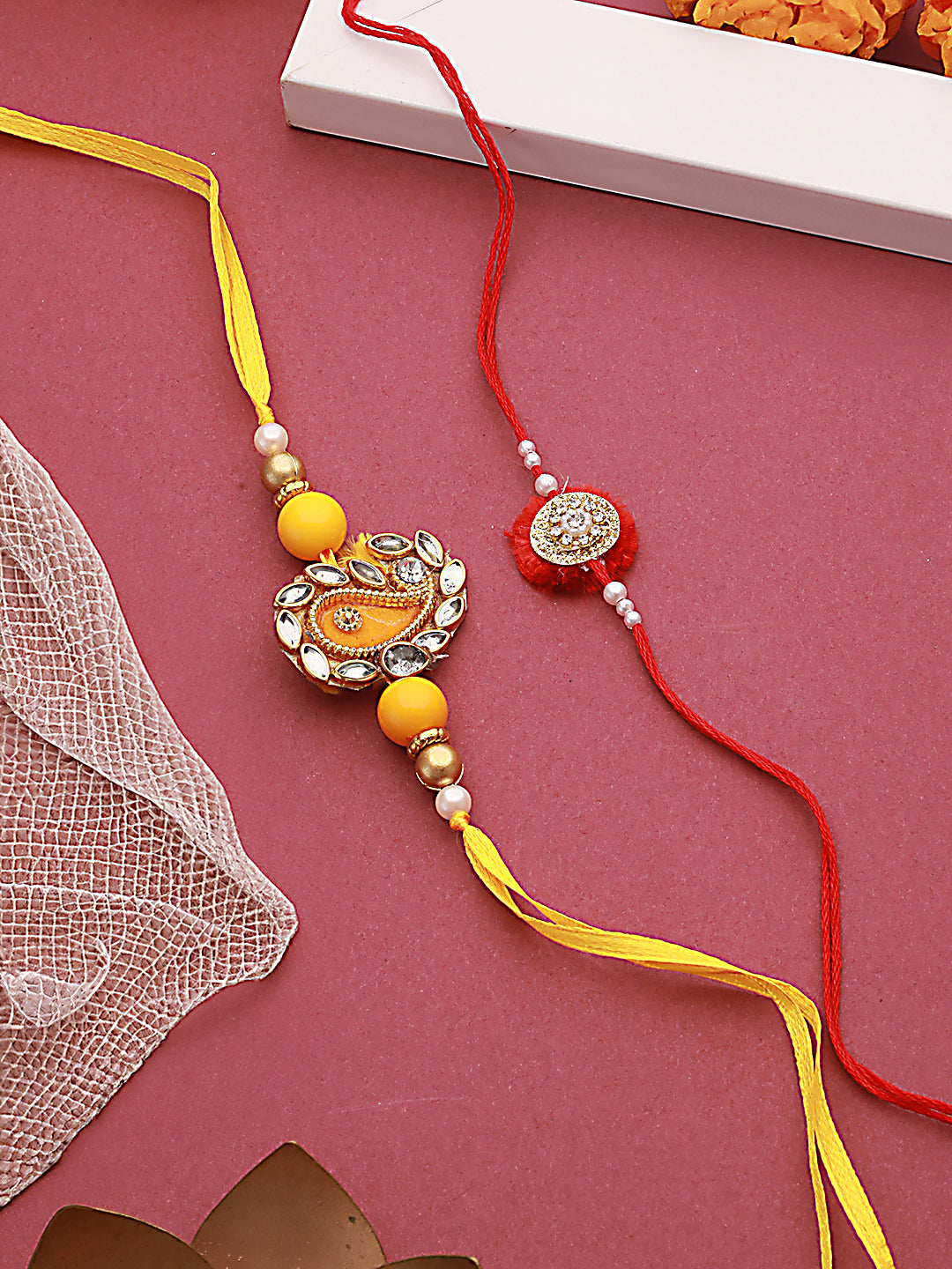 Jazz And Sizzle Unisex Set Of 2 Red & Yellow Leaf Shaped Rakhi With Roli & Chawal