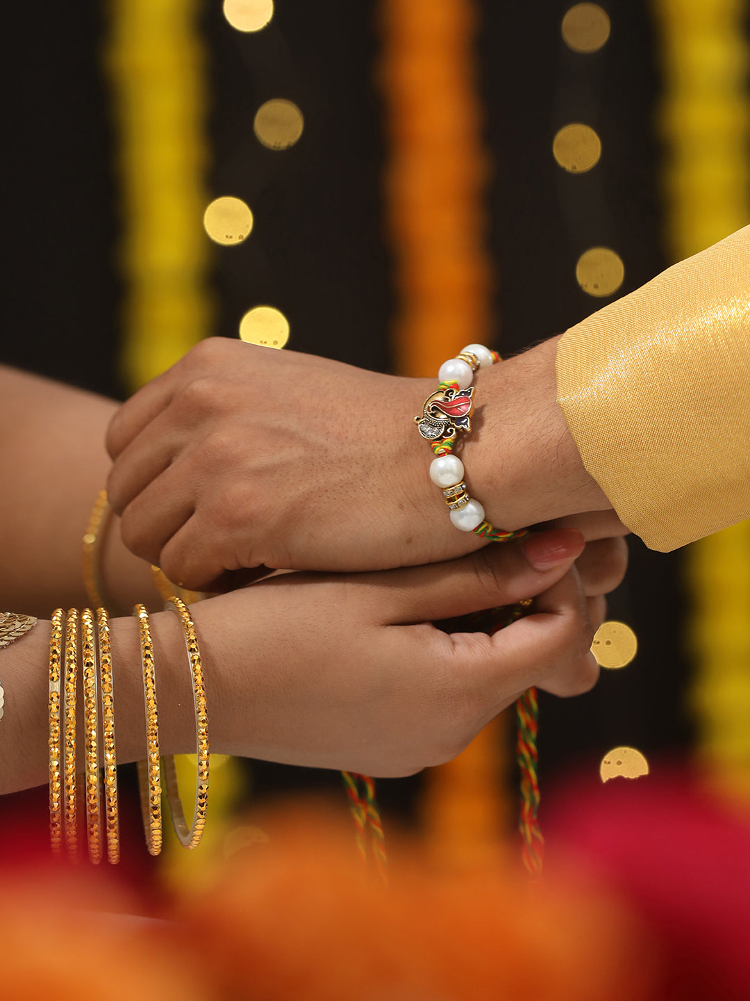 Jazz And Sizzle Set Of 2 Ganesh Bhaiya Bhabhi Tasseled Rakhi With Roli & Chawal