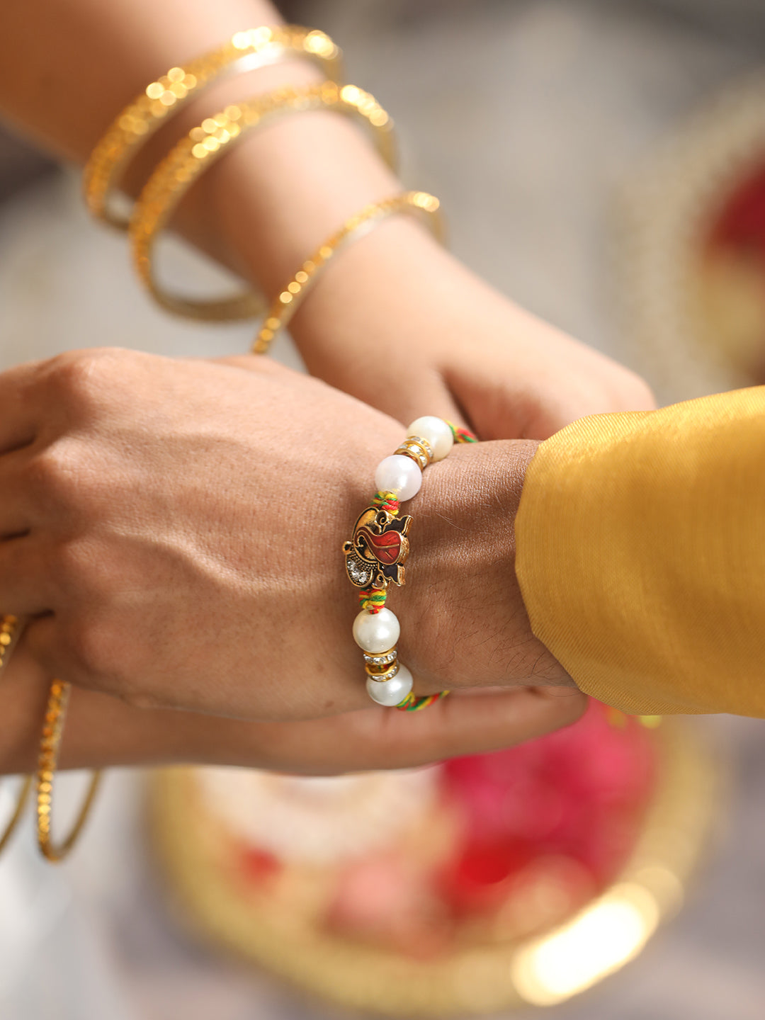 Jazz And Sizzle Set Of 2 Ganesh Bhaiya Bhabhi Tasseled Rakhi With Roli & Chawal