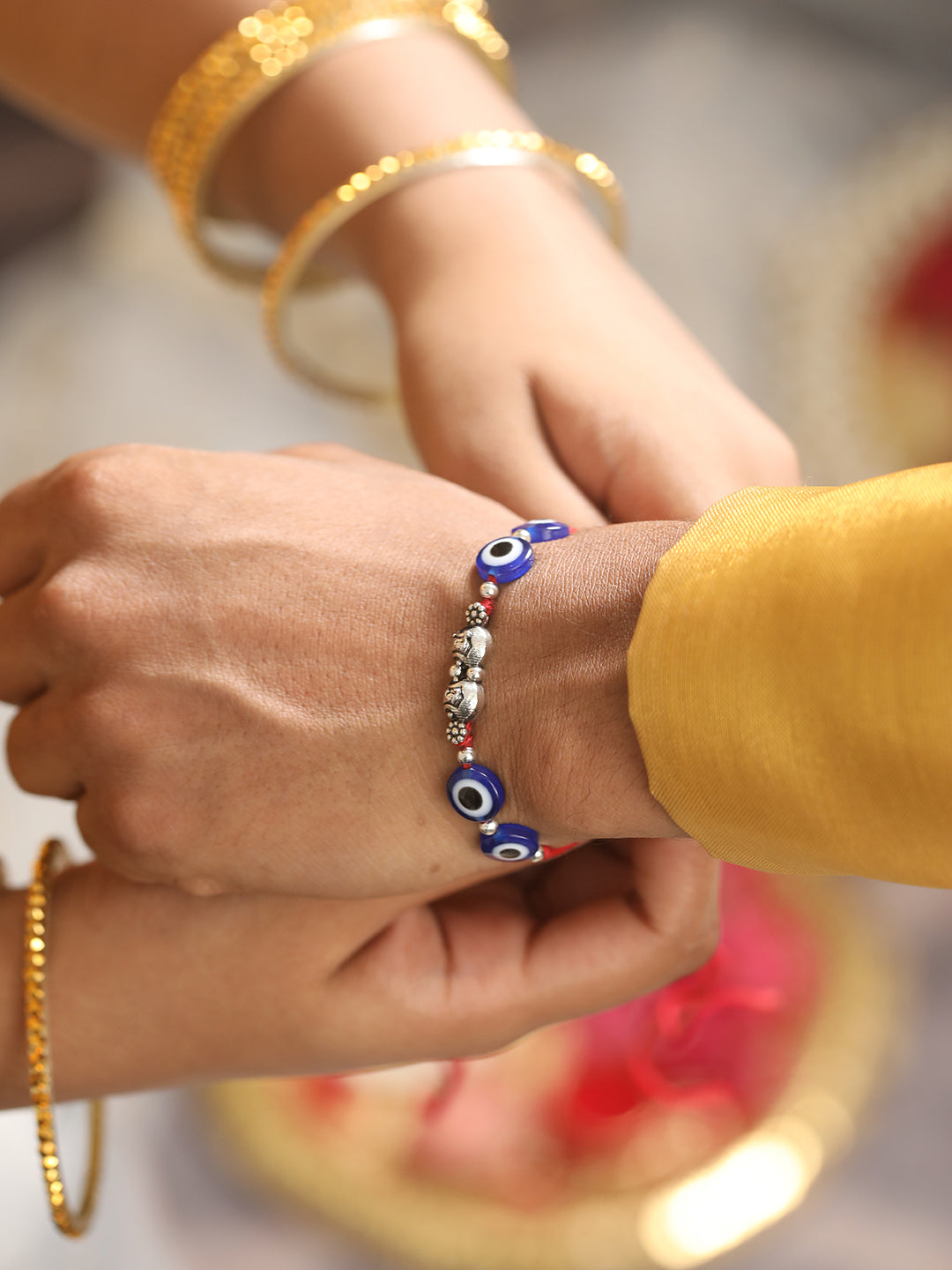 Jazz And Sizzle Set Of 2 Evil Eye Bhaiya Bhabhi Tasseled Rakhi With Roli & Chawal