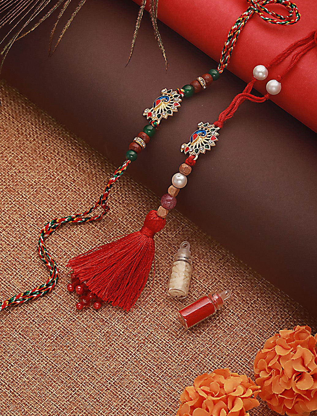 Jazz And Sizzle Set Of 2 Peacock Shaped Bhaiya Bhabhi Tasseled Rakhi