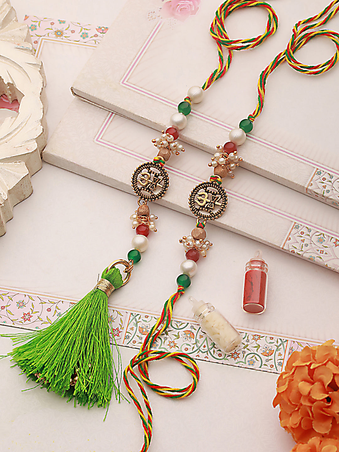 Jazz And Sizzle Set Of 2 Trishul & Pearl Beaded Bhaiya Bhabhi Tasseled Rakhi