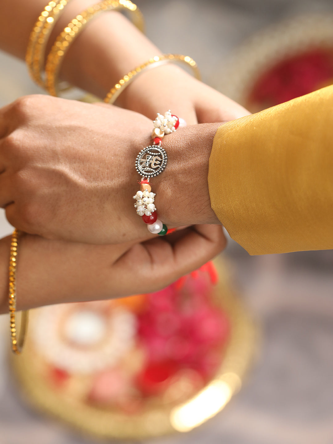 Jazz And Sizzle Set Of 2 Trishul & Shiva Dumroo Mogra Beaded Rakhi