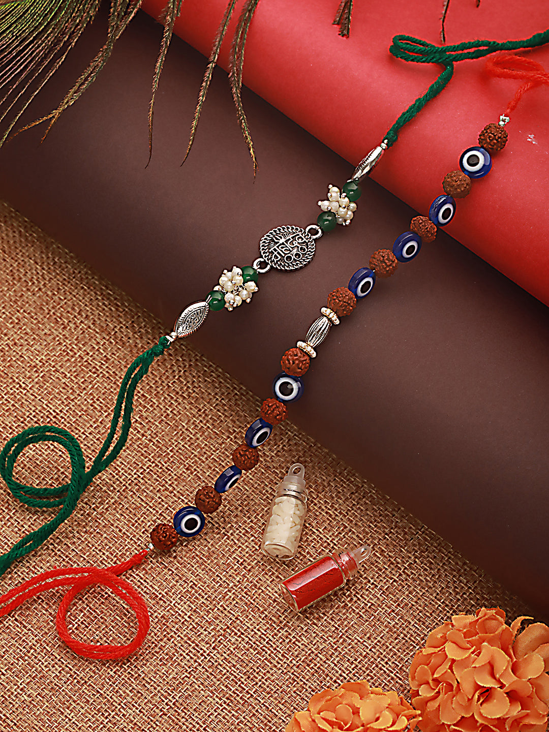 Jazz And Sizzle Set Of 2 Rudraksh Evil Eye & Mahadev Rakhi With Roli & Chawal