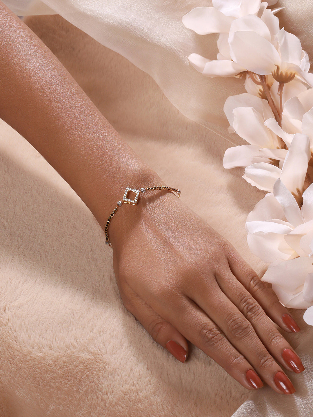 Jazz And Sizzle Gold-Plated Black Beaded & Stone-Studded hand Mangalsutra Bracelet - Jazzandsizzle