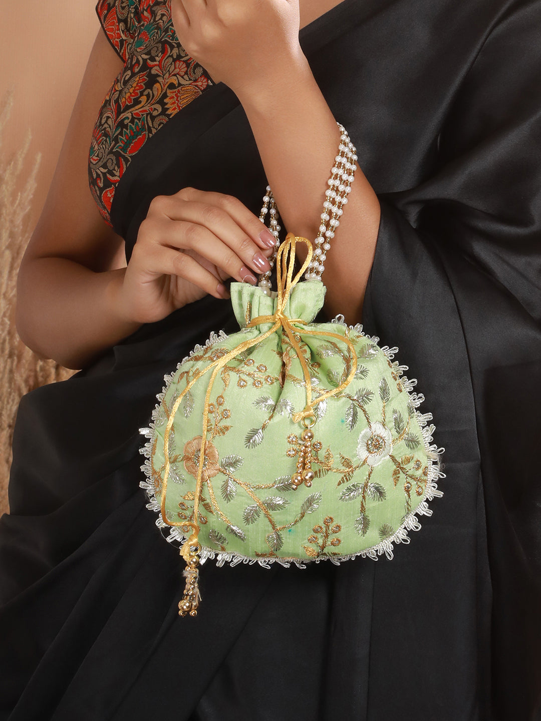 Green & Gold-Toned with Rich Embroidered Potli Clutch - Jazzandsizzle