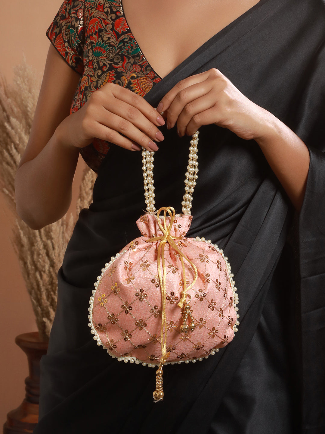 Peach-Coloured & Gold-Toned Embellished Potli Clutch - Jazzandsizzle