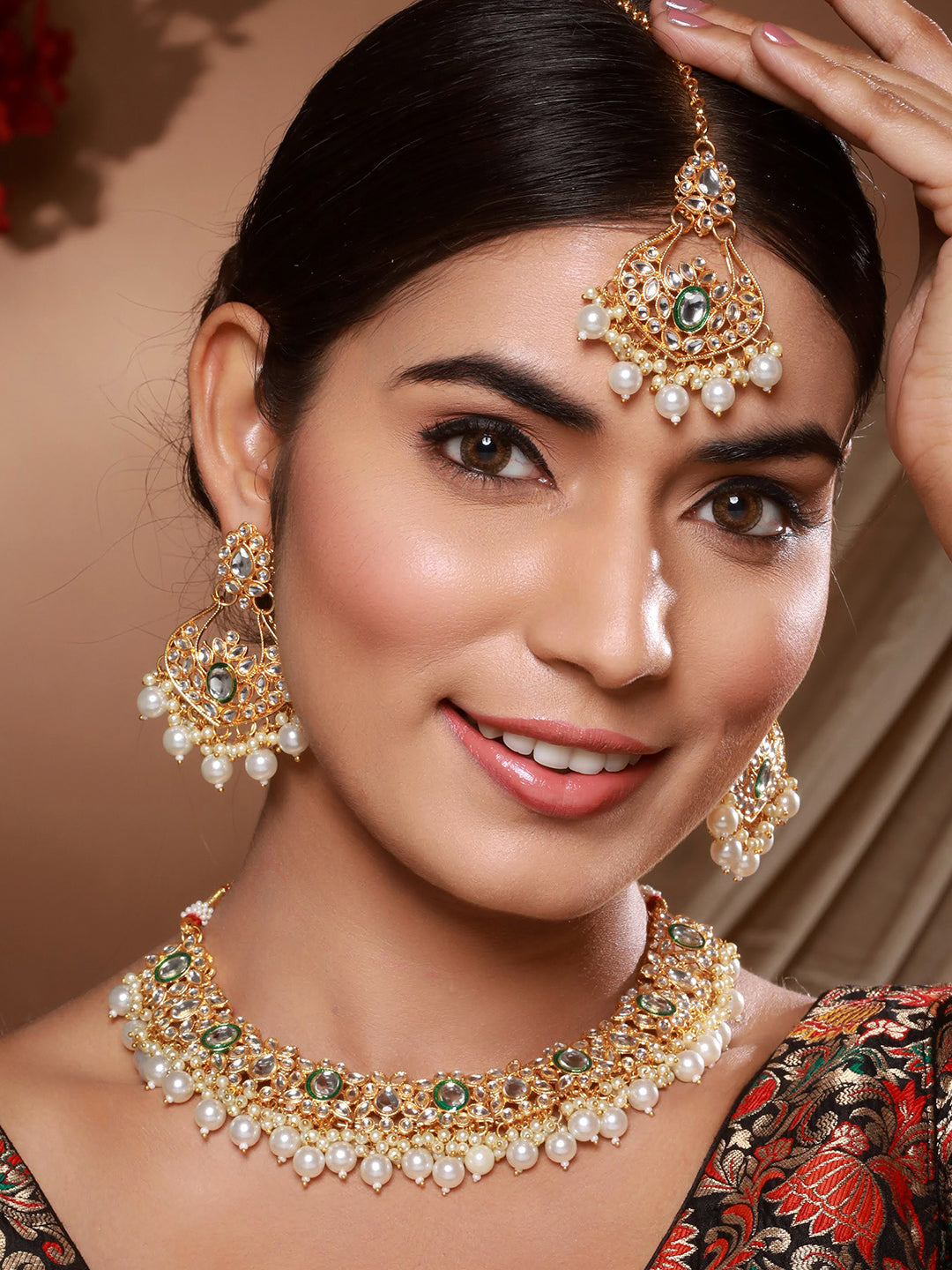 Jazz and Sizzle Gold Plated Kundan Studded & Beaded Jewellery Set with Maangtikka