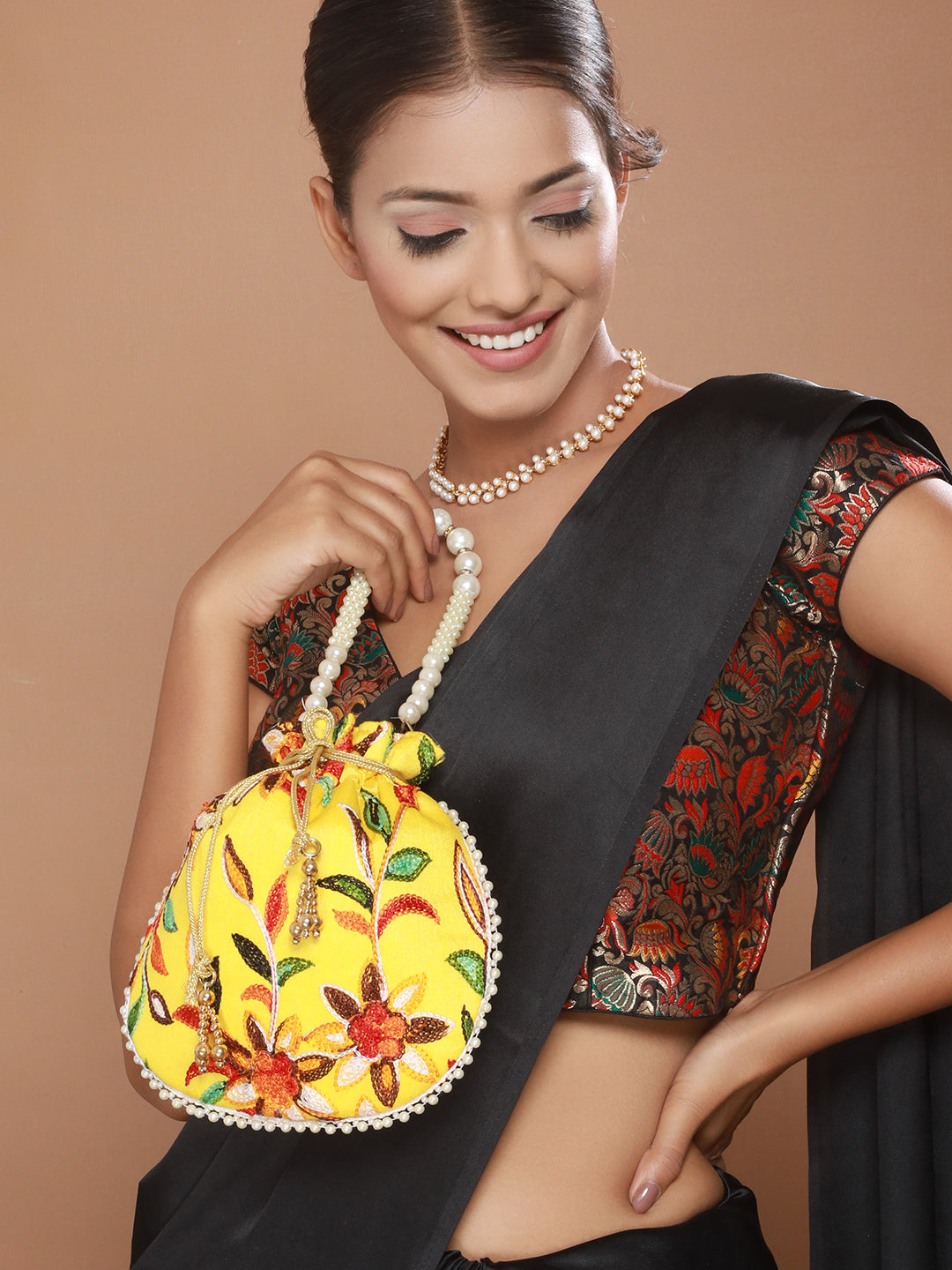 Embroidered Potli Clutch - Jazzandsizzle