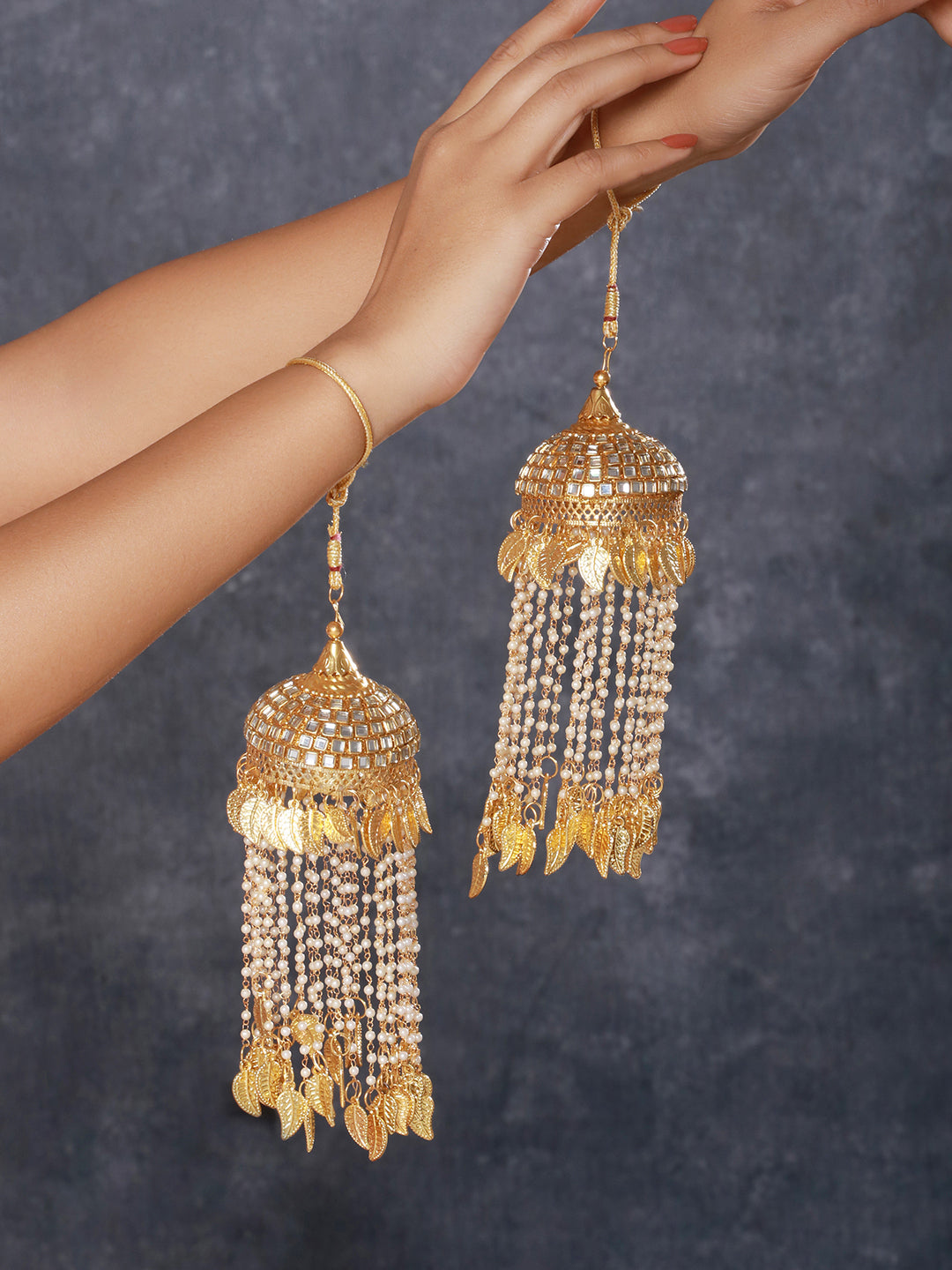 Set Of 2 Gold-Plated Stone Studded & Pearl Beaded Bridal Kaleera Secured with drawstring closure. - Jazzandsizzle