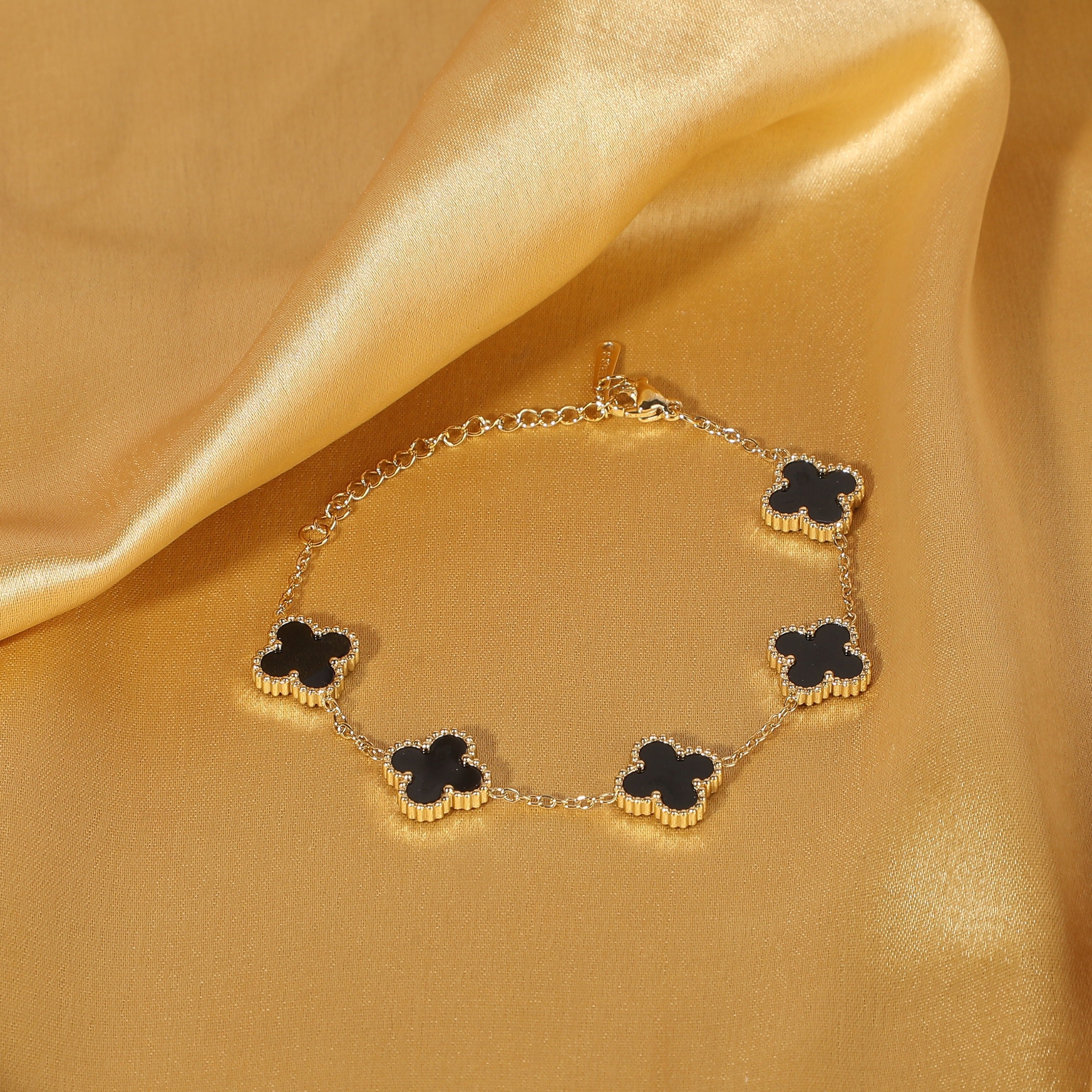 Jazz and Sizzle Trendy Gen-Z Gold Plated Stainless Steel Black Colour Flower Charm Chain Bracelet