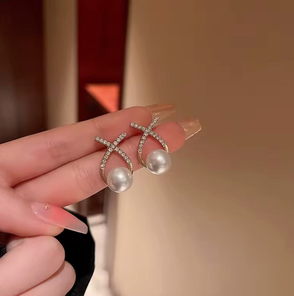Elegant Pearl Drop Earrings with Gold-Tone Crystal X Design