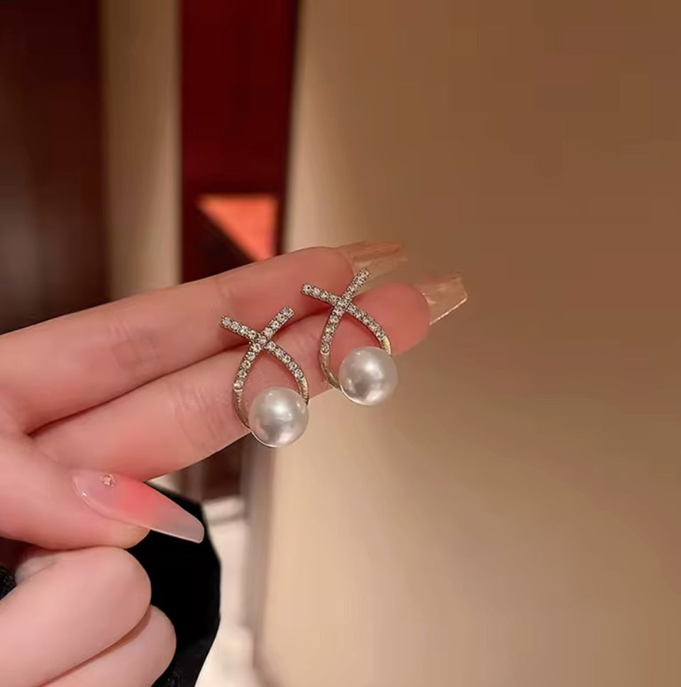 Elegant Pearl Drop Earrings with Gold-Tone Crystal X Design