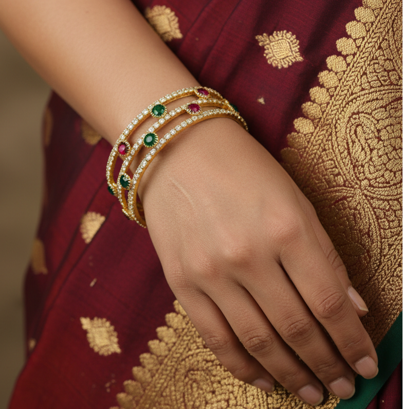 Jazz And Sizzle Set Of 2 Gold Plated Cubic Zirconia Studded Red & Green Stone Beaded Bangles