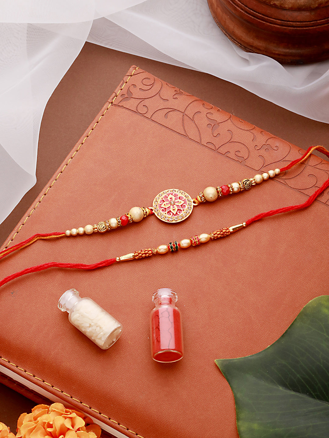 Jazz And sizzle Set Of 2 Enameled & Pearl Beaded Thread Rakhi With Roli Chawal & Rakhi Card