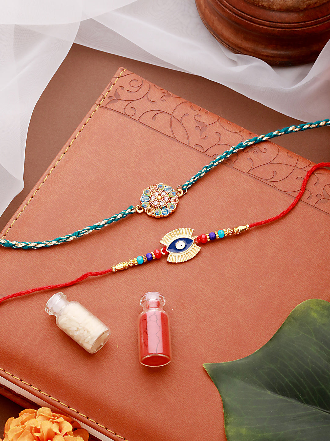 Jazz And Sizzle Set Of 2 Gold-Toned Evil Eye & Leaf Meena Work Designer Rakhi