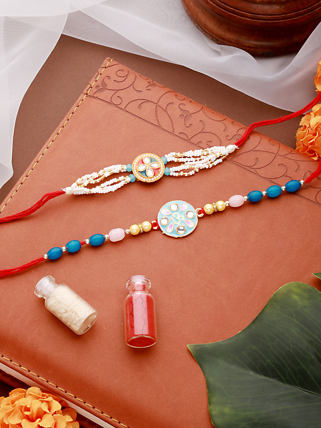 Jazz And Sizzle Set Of 2 Meena Work & Pearl Beaded Designer Thread Rakhi With Roli Chawal