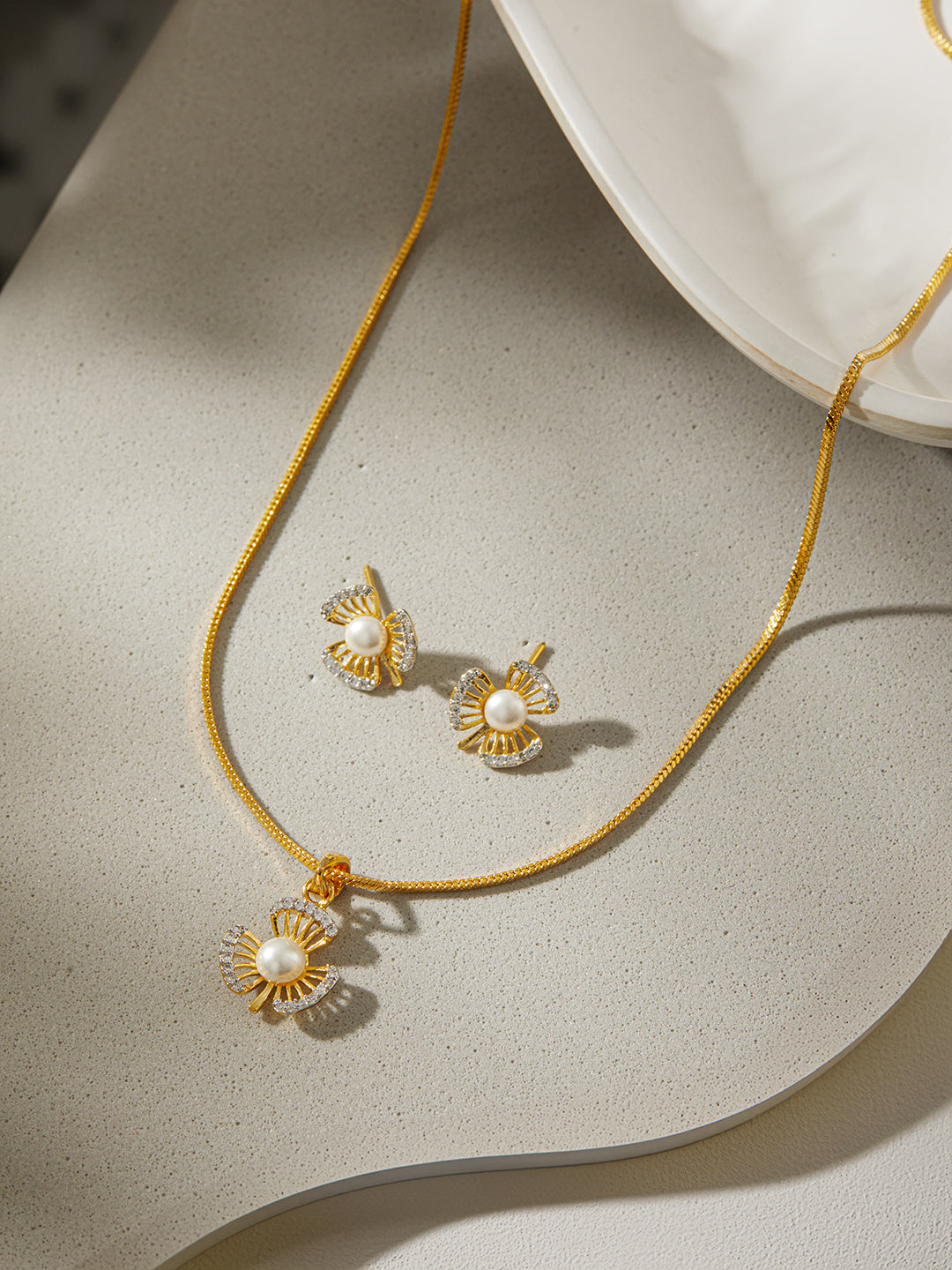 Jazz and Sizzle Gold-Plated AD Studded Pendant with Earrings and Chain