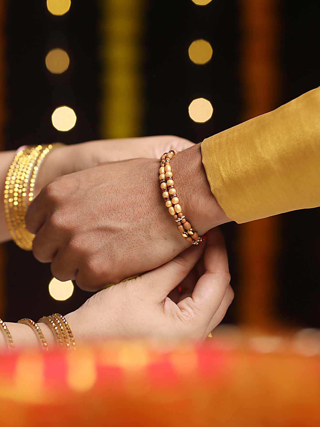 Set Of 3 Gold Toned Pearl & Meena Work Thread Rakhi With Roli Chawal