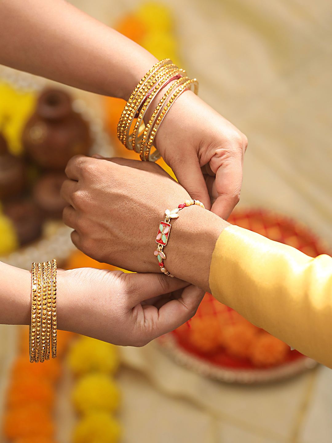 Set Of 3 Gold Toned Pearl & Meena Work Thread Rakhi With Roli Chawal