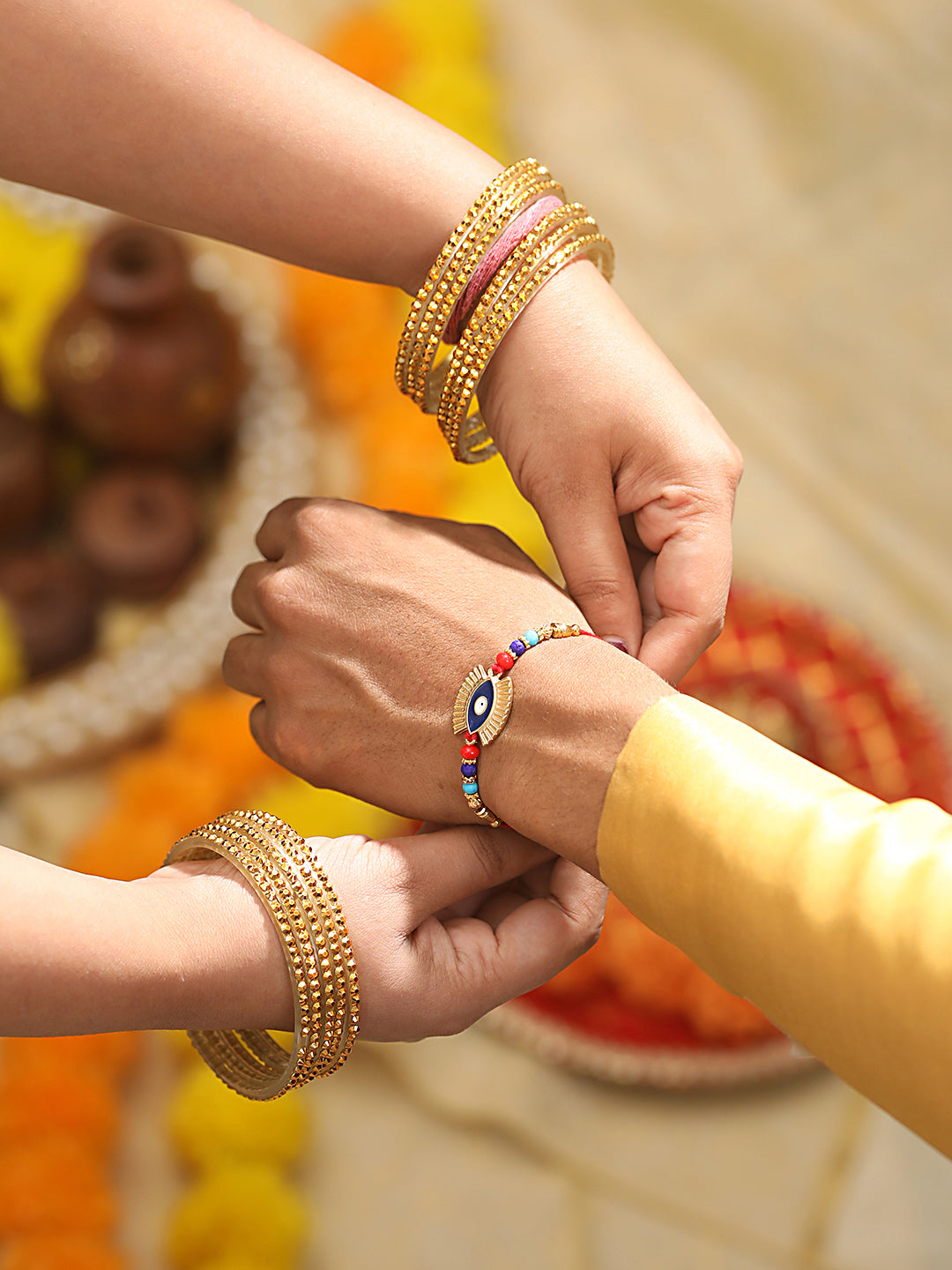 Jazz And Sizzle Set Of 2 Gold-Toned Evil Eye & Leaf Meena Work Designer Rakhi