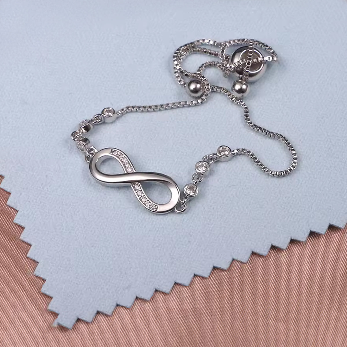 Jazz And Sizzle Silver Plated CZ Studded Infinity Adjustable Bracelet For Valentines Gift