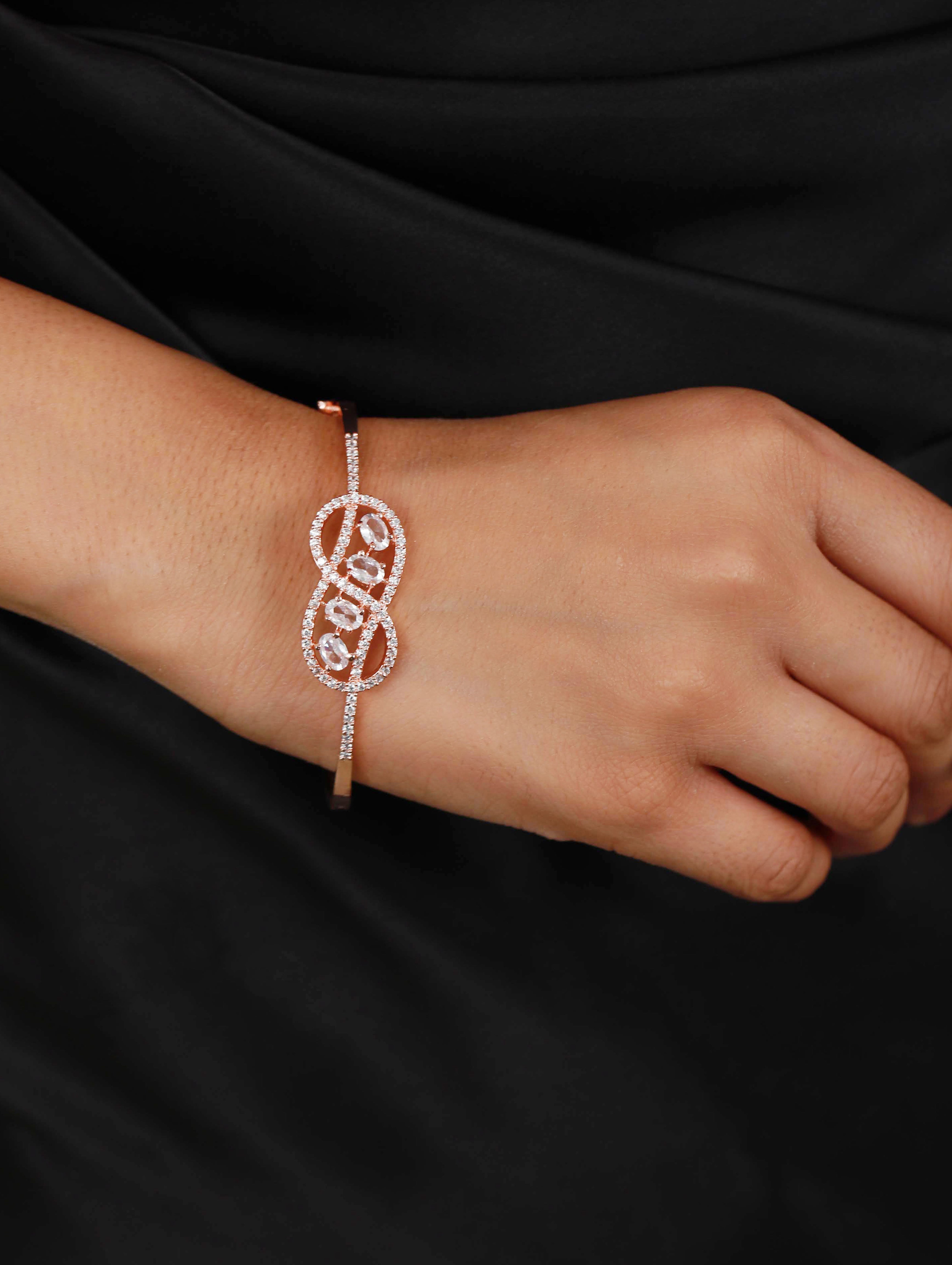 Rose Gold Plated White American Diamond Studded Handcrafted Infinity Shaped Bangle-Style Bracelet - Jazzandsizzle