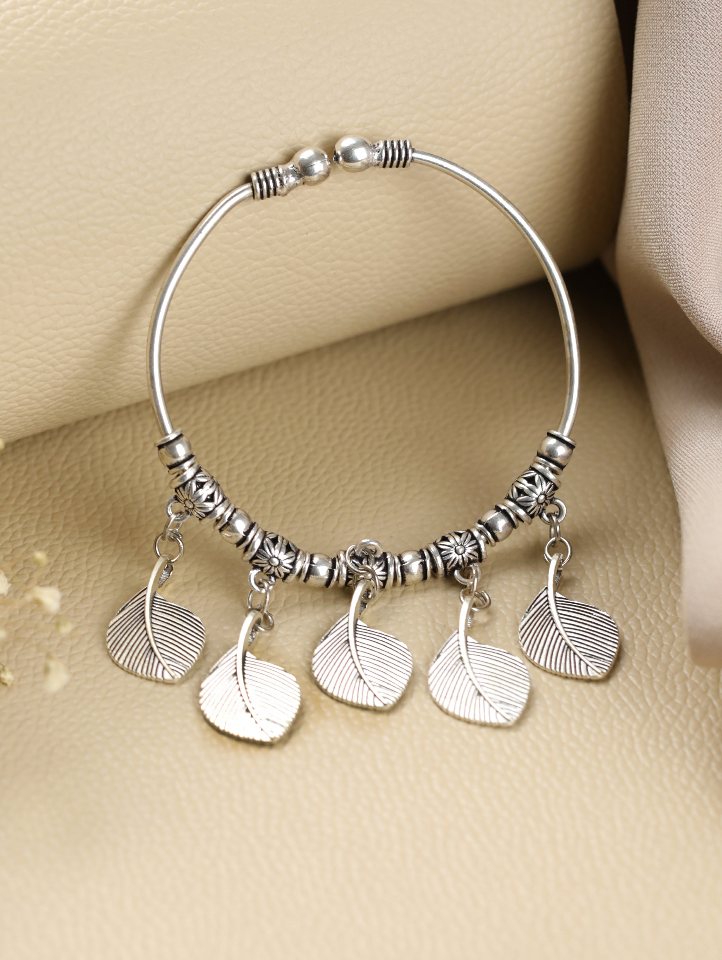 Women Oxidised Silver-Toned & Oxidised Tribal Brass Leaf Charm Bracelet - Jazzandsizzle