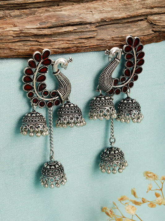 Silver-Plated Maroon Stone studded Handcrafted Peacock Shaped Jhumkas Earrings - Jazzandsizzle