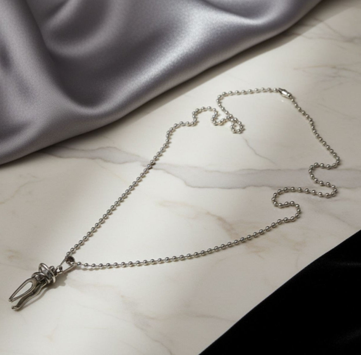 Jazz and Sizzle Silver Plated Stainless Steel Couple Hug Pendant with Chain