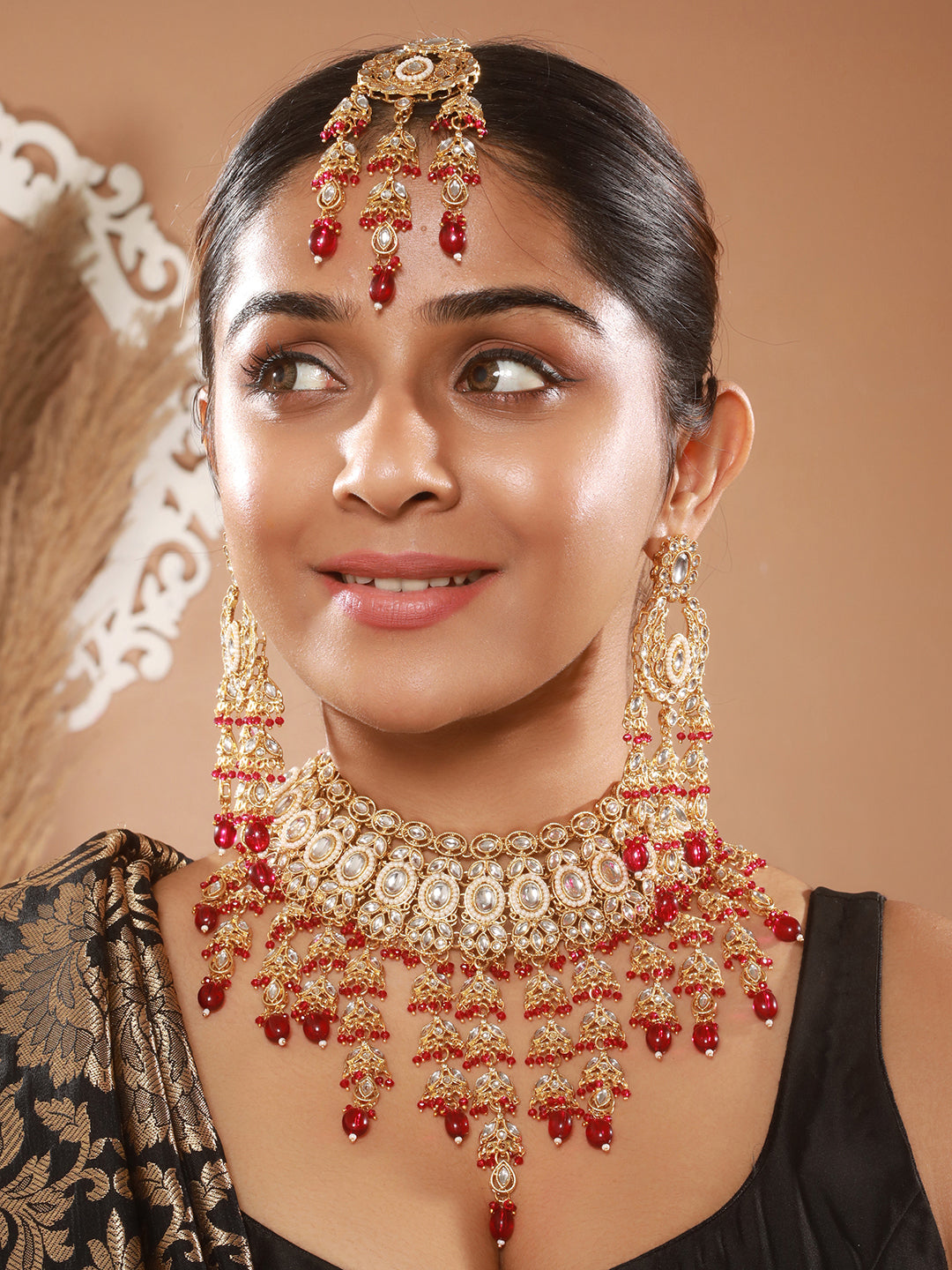 Jazz And Sizzle 18 k Gold-Plated Red & White Kundan Studded & Beaded Handcrafted Jewellery Set with Maangtikka