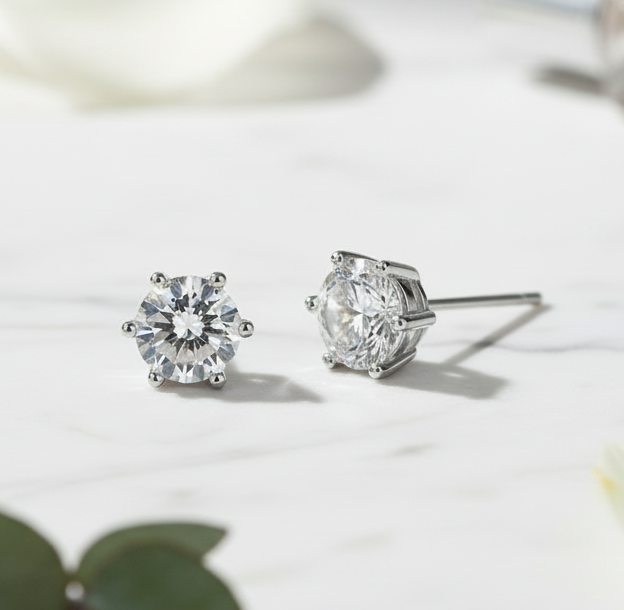 Jazz And Sizzle Silver Plated American Diamond Studded Stud Earrings