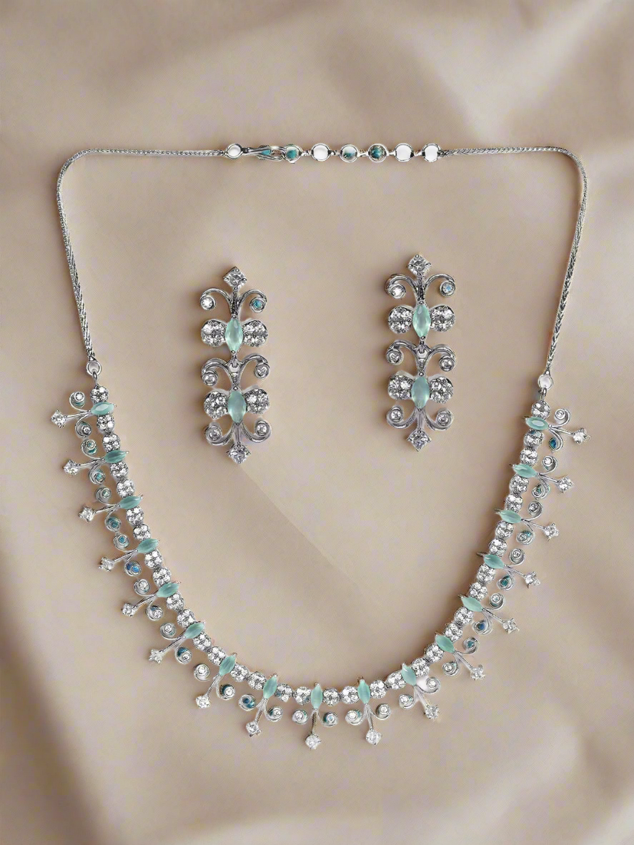 Silver-Plated White & Sea Green Ad-Studded Handcrafted Jewellery Set