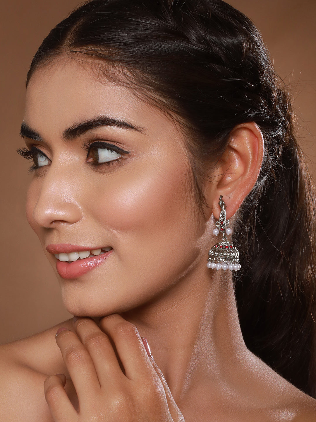 Jazz And Sizzle Silver-Plated Peacock Shaped Jhumka Earrings